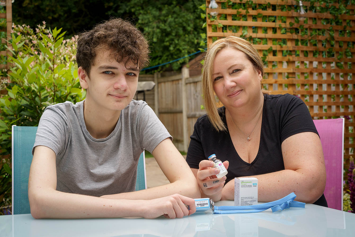 Xander Garrity with mum Stacey and home immunoglobulin infusion kit small